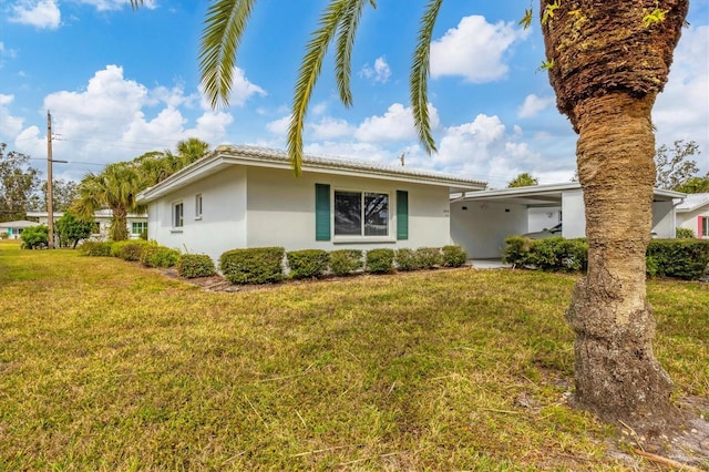 single story home featuring a front yard