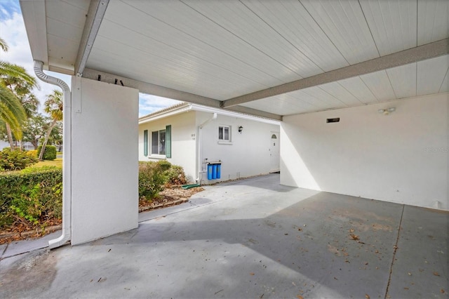 view of patio featuring a carport