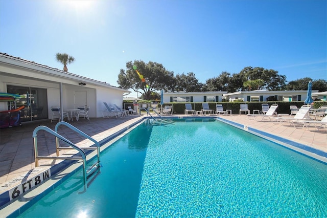 view of pool with a patio