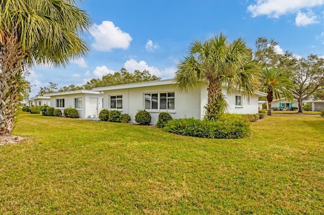 exterior space with a yard