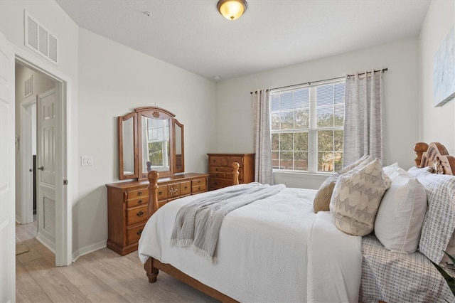 bedroom featuring light hardwood / wood-style floors