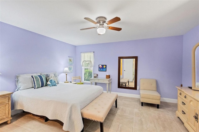 bedroom featuring ceiling fan and light tile patterned floors