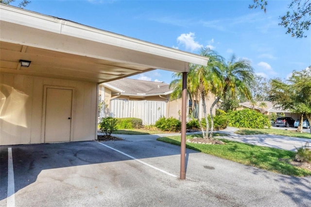 view of car parking featuring a carport