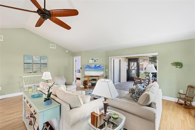 living room featuring light wood-type flooring, lofted ceiling, and ceiling fan