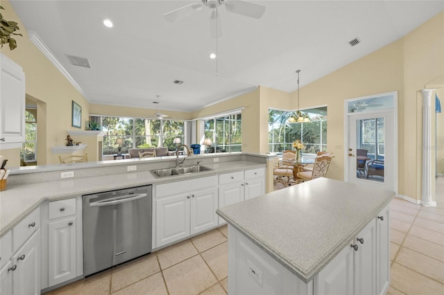 kitchen featuring sink, white cabinetry, hanging light fixtures, dishwasher, and a kitchen island