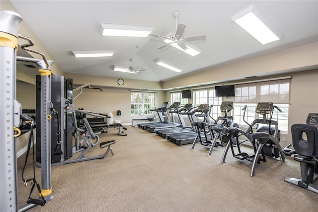 workout area with carpet floors, ceiling fan, and vaulted ceiling