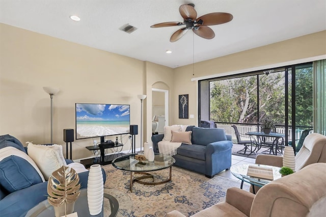 living room with recessed lighting, visible vents, a ceiling fan, and tile patterned flooring