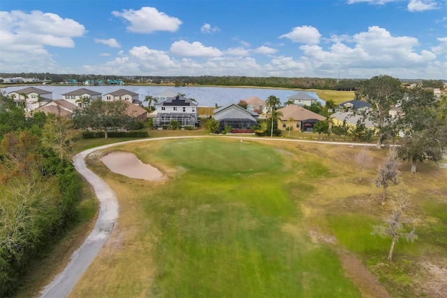 bird's eye view with a water view and a residential view