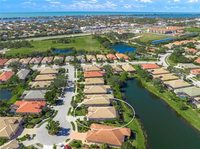 drone / aerial view featuring a water view