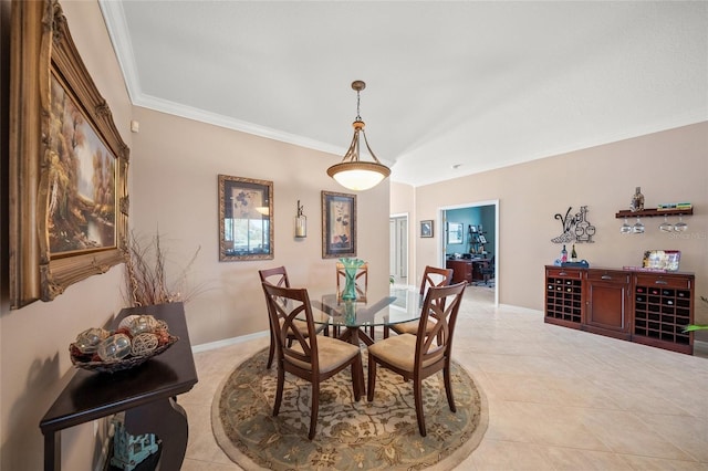 tiled dining area with crown molding