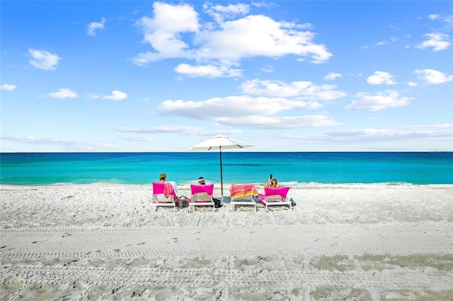 property view of water featuring a beach view