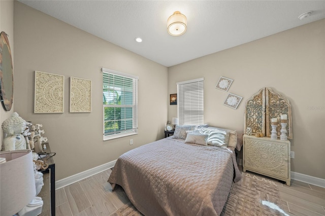 bedroom featuring light hardwood / wood-style flooring