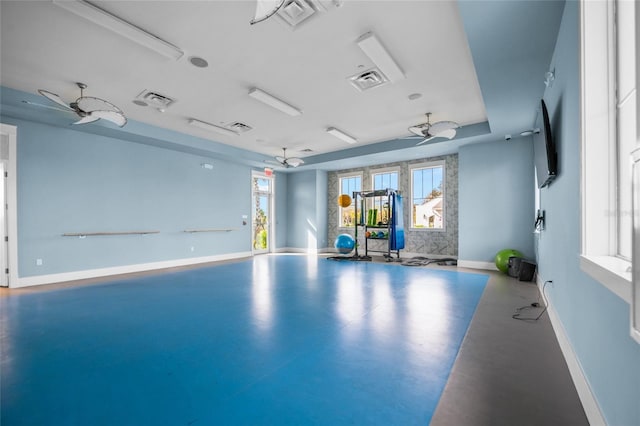 workout room with ceiling fan