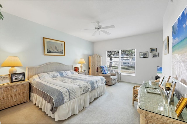 bedroom with ceiling fan and carpet floors