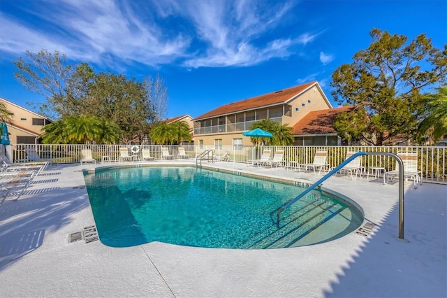 view of swimming pool with a patio