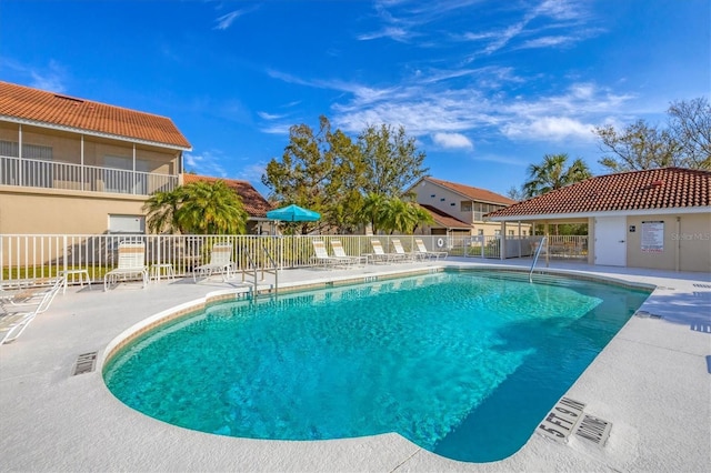 view of pool with a patio area