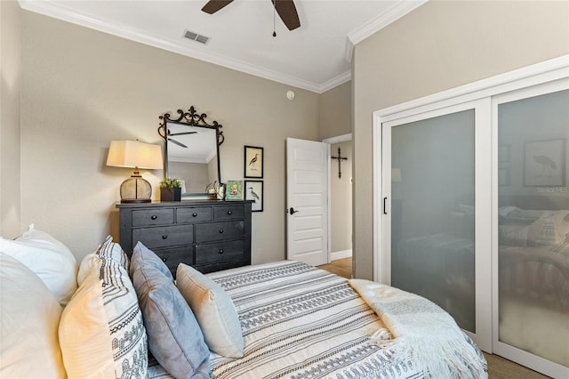 bedroom featuring ornamental molding and ceiling fan