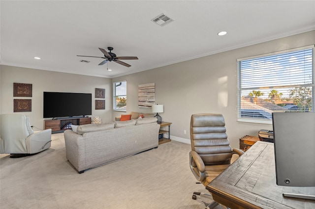 living room with light carpet, crown molding, and ceiling fan