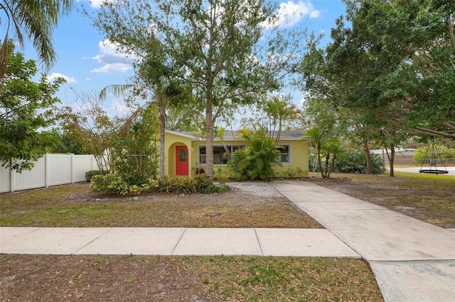 view of front of property with a front lawn