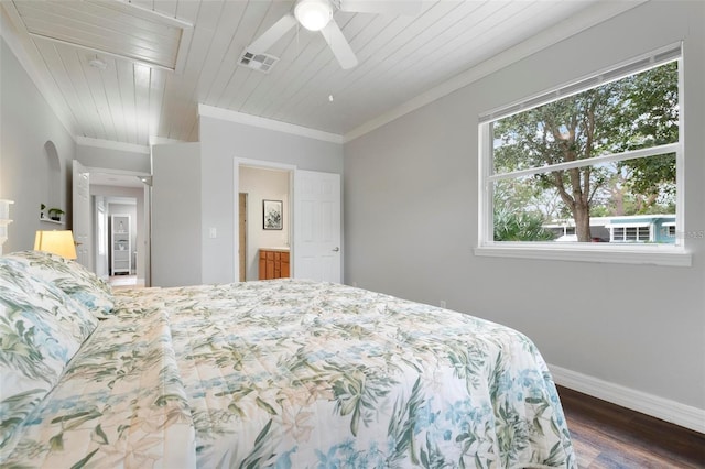 bedroom with ceiling fan, ornamental molding, dark hardwood / wood-style floors, and wooden ceiling