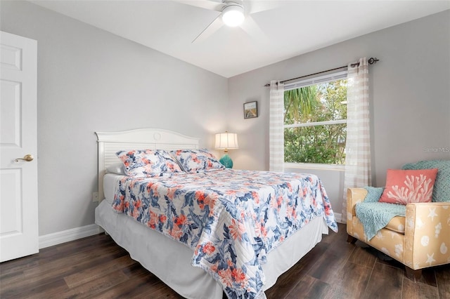 bedroom with dark wood-type flooring and ceiling fan