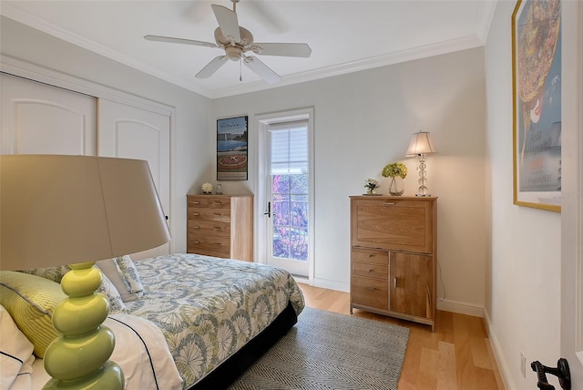 bedroom with crown molding, ceiling fan, and light hardwood / wood-style floors