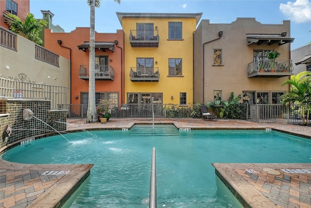 view of pool featuring pool water feature