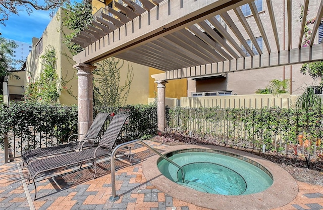 view of pool featuring an in ground hot tub and a pergola