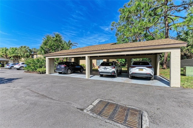 view of car parking with a carport