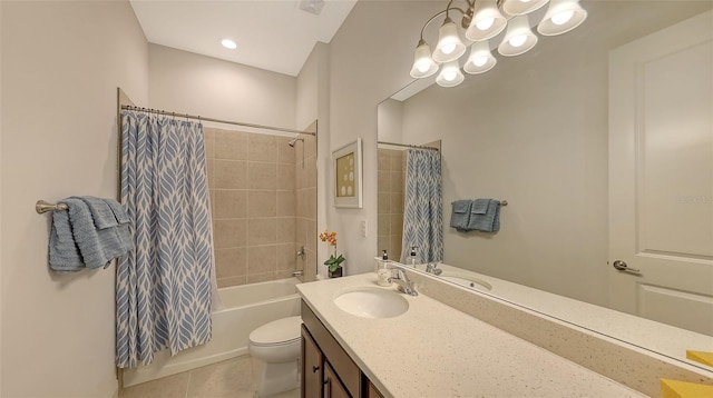 full bathroom featuring vanity, tile patterned flooring, shower / bath combination with curtain, and toilet