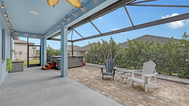 sunroom / solarium featuring ceiling fan