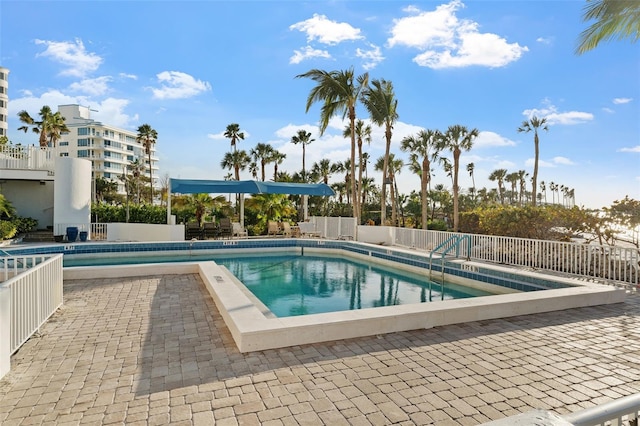 view of pool featuring a patio area