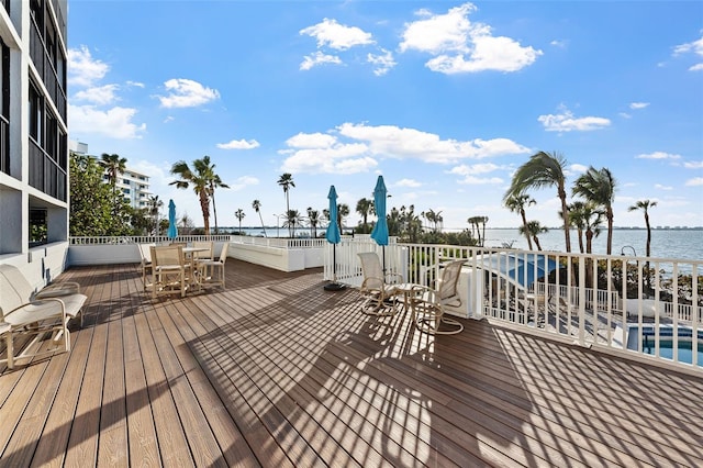 deck featuring a water view