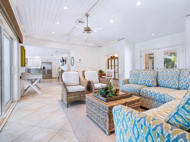 tiled living room with lofted ceiling, wood ceiling, and french doors