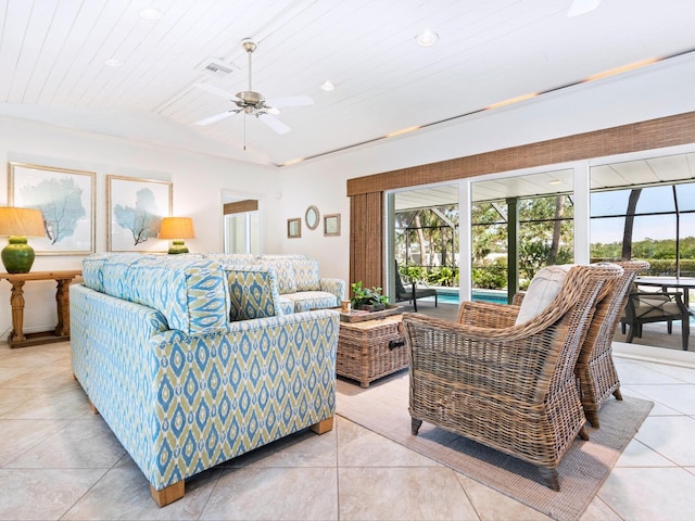 tiled living room featuring wood ceiling, vaulted ceiling, and ceiling fan