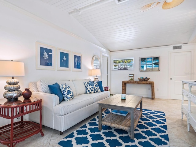 tiled living room with vaulted ceiling