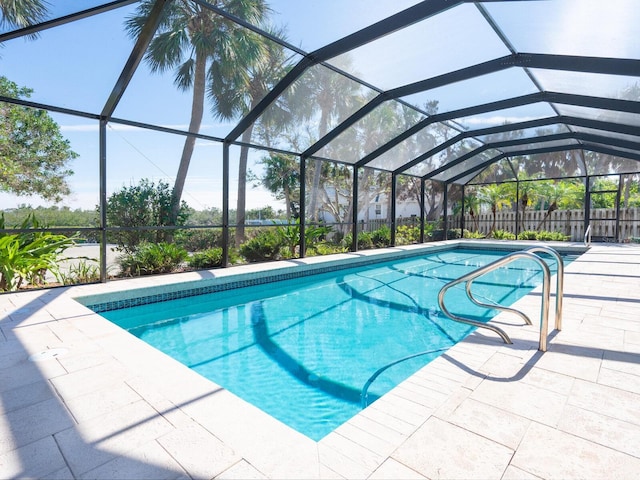 view of pool featuring a patio and a lanai