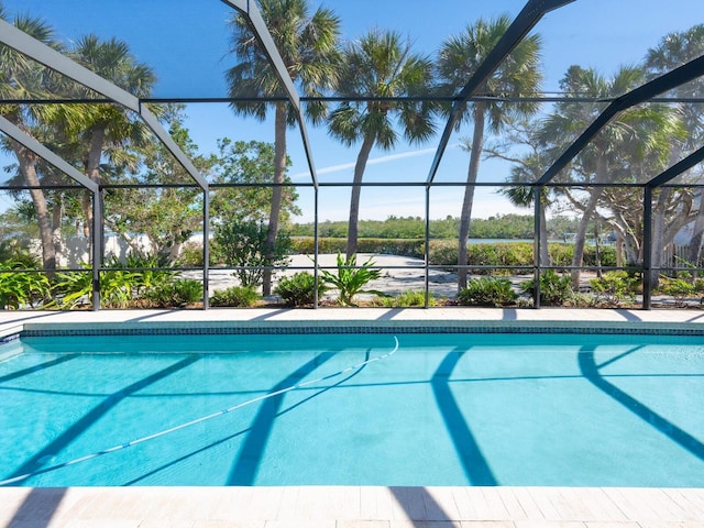 view of pool featuring a lanai