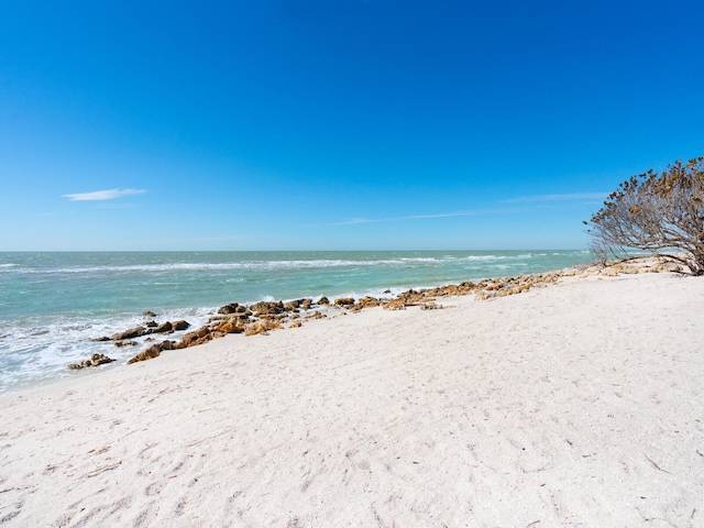 property view of water with a beach view