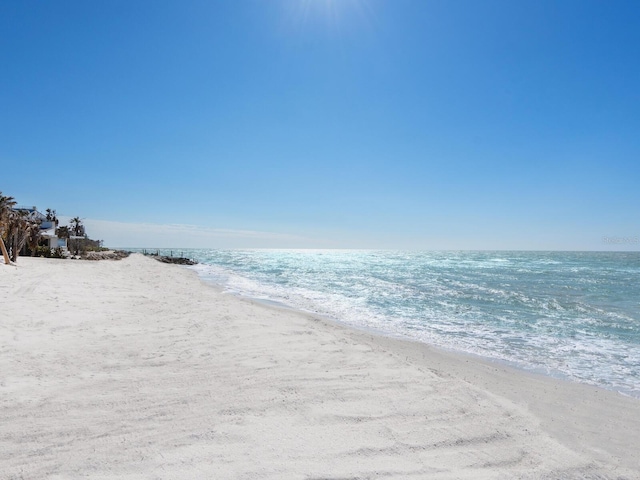 water view featuring a beach view