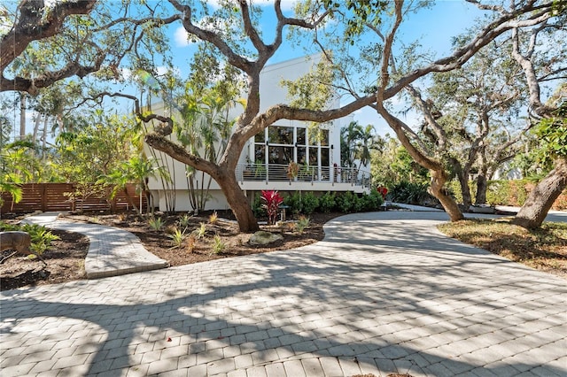 view of front of home with a sunroom