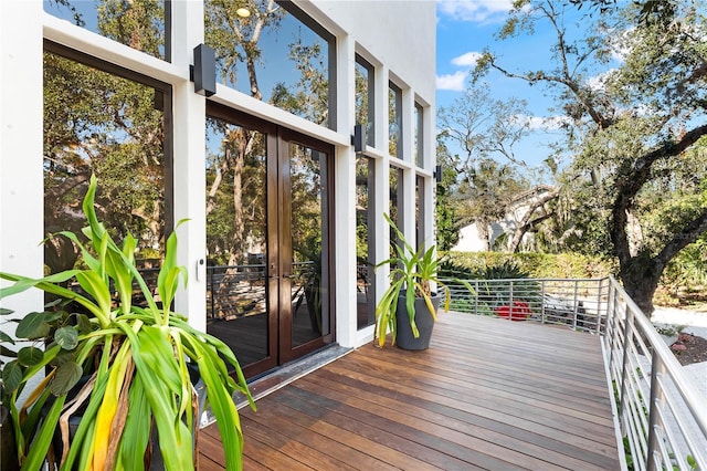 wooden terrace featuring french doors