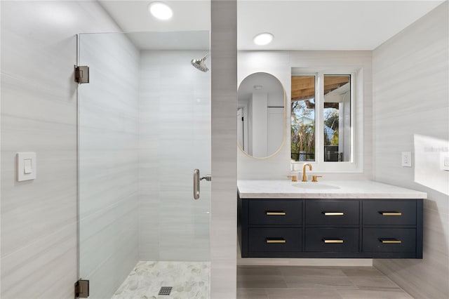 bathroom featuring vanity and walk in shower