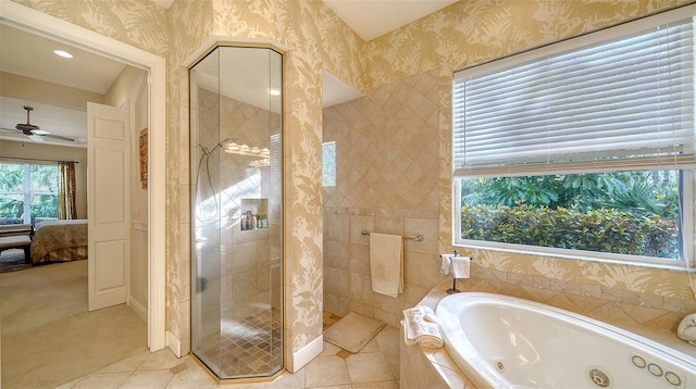 bathroom with ceiling fan, independent shower and bath, and tile patterned flooring