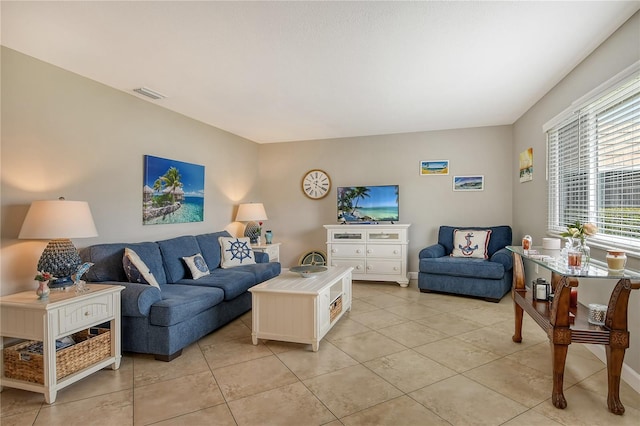 living room with light tile patterned floors