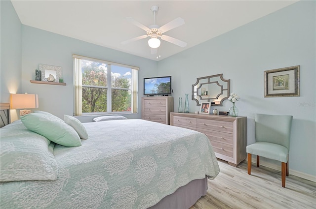 bedroom featuring light hardwood / wood-style floors and ceiling fan