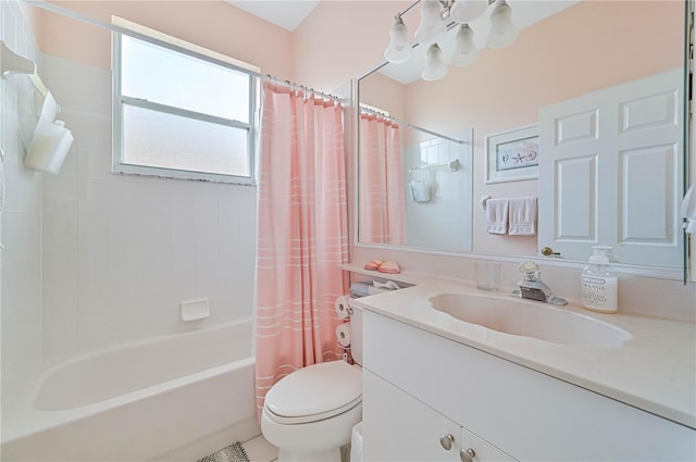 full bathroom featuring a notable chandelier, vanity, shower / bathtub combination with curtain, and toilet