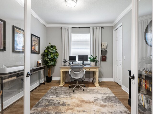 17459 Hickok Belt Loop, Bradenton, FL 34211 - office area featuring wood finished floors, french doors, ornamental molding, and baseboards