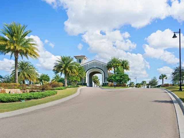 17459 Hickok Belt Loop, Bradenton, FL 34211 - view of asphalt road featuring curbs and street lighting