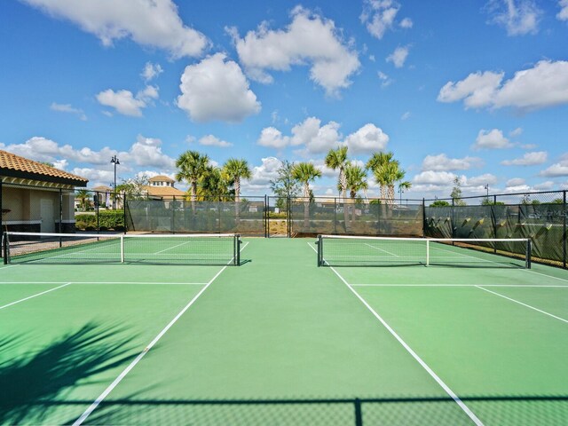 17459 Hickok Belt Loop, Bradenton, FL 34211 - view of tennis court featuring fence and community basketball court